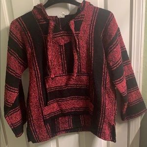 Woman’s sweater.